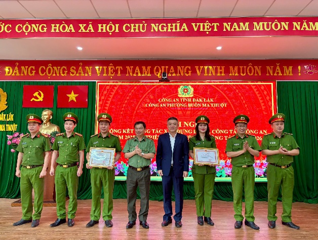 ''''A group of people in uniform standing on a stage

AI-generated content may be incorrect.''''