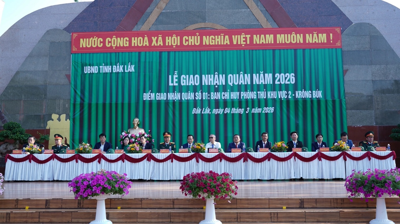 'A group of people sitting at a podium

AI-generated content may be incorrect.'