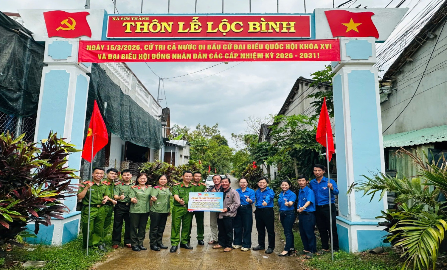 'A group of people standing in front of a sign
 AI-generated content may be incorrect.'