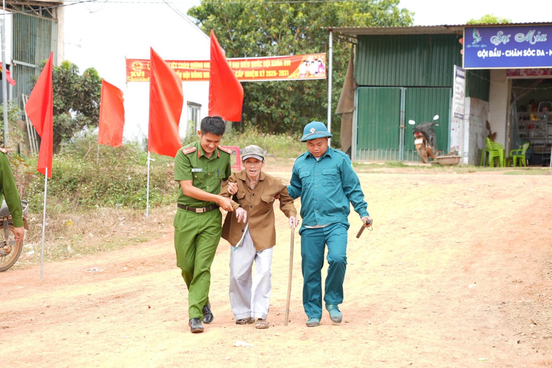 ''A group of people walking on a dirt road
 AI-generated content may be incorrect.''