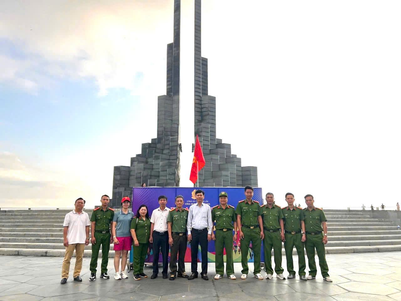 'A group of people in uniform standing in front of a building
AI-generated content may be incorrect.'