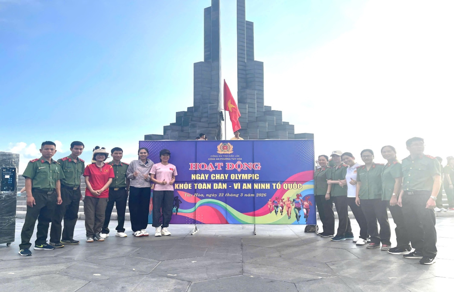 'A group of people posing for a photo
AI-generated content may be incorrect.'