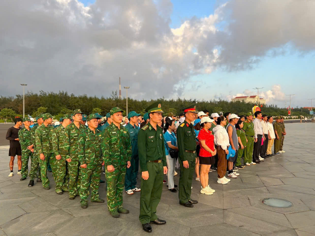 'A group of people in uniform standing in a line
AI-generated content may be incorrect.'