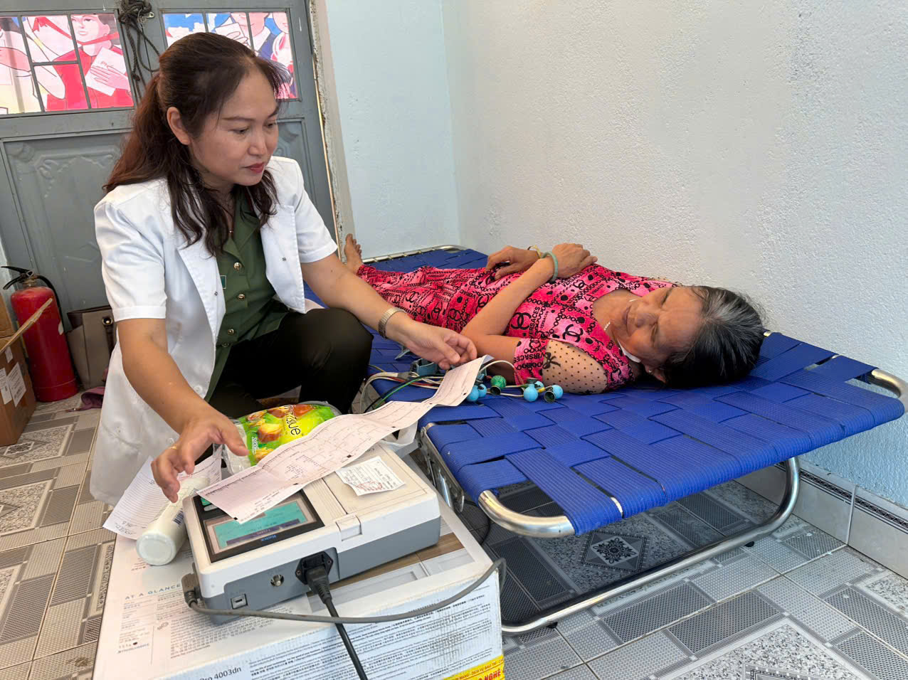 'A person in a white coat and a pink dress lying on a blue bed

AI-generated content may be incorrect.'