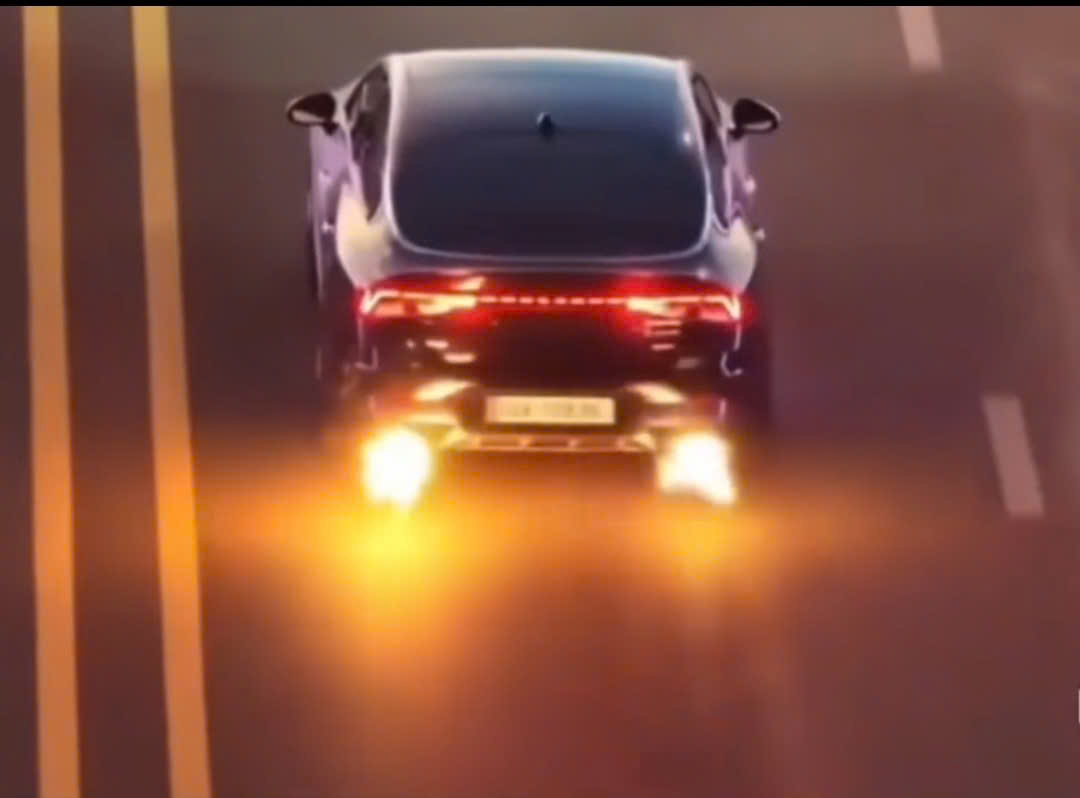 ''A car driving on a road
 AI-generated content may be incorrect.''