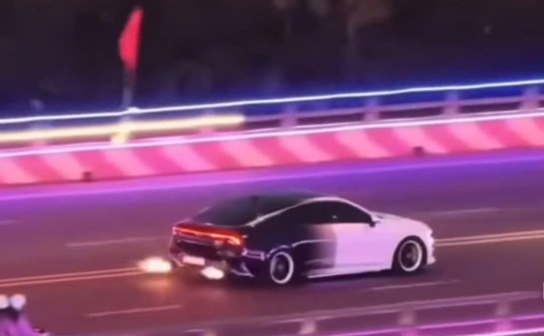 ''A car on a road
 AI-generated content may be incorrect.''