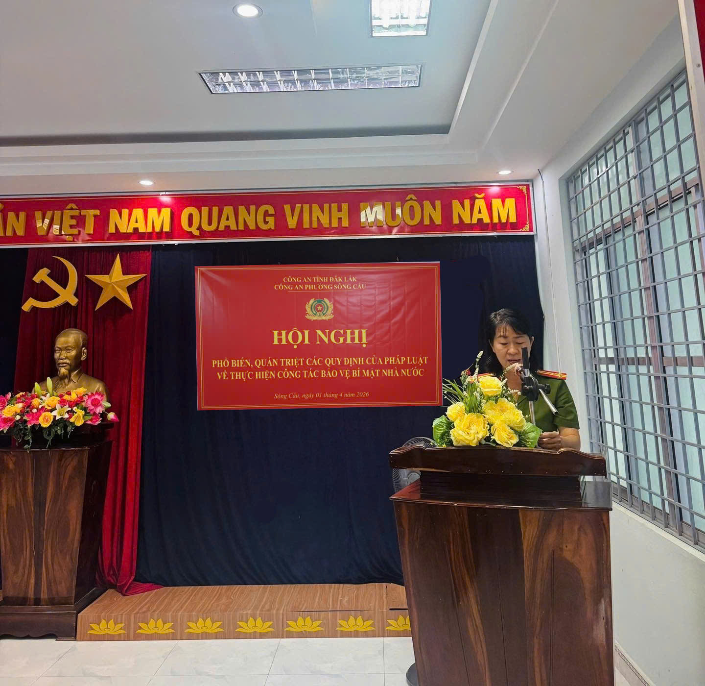 'A person standing at a podium
 AI-generated content may be incorrect.'