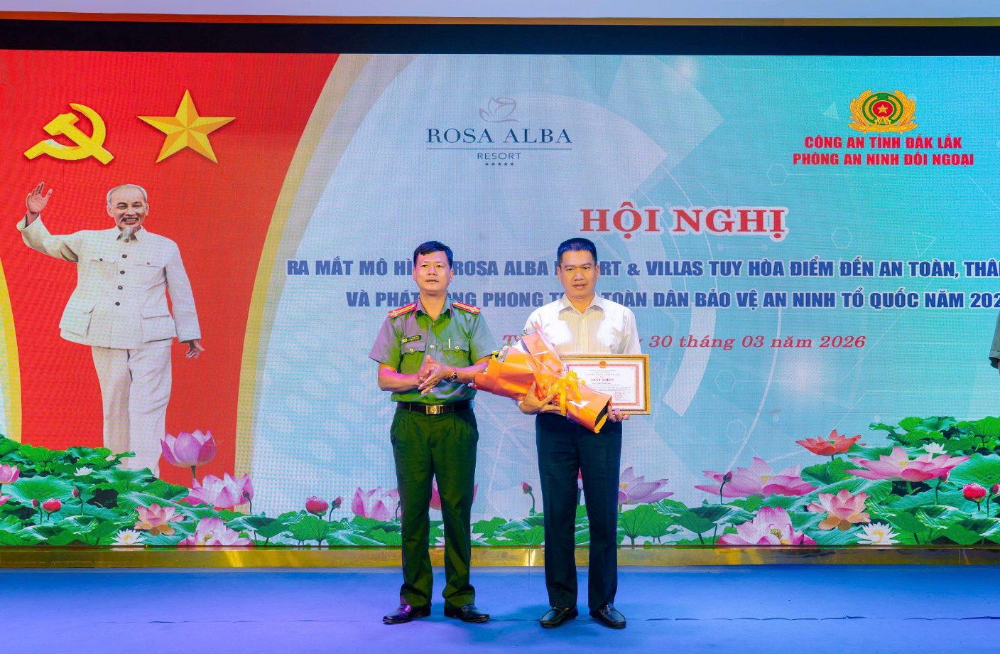 ''''''A person holding a trophy and a person standing on a stage
 AI-generated content may be incorrect.''''''